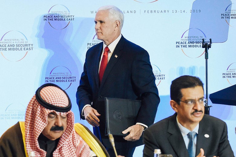 Mike Pence leaves after his speech during the conference on Peace and Security in the Middle East.